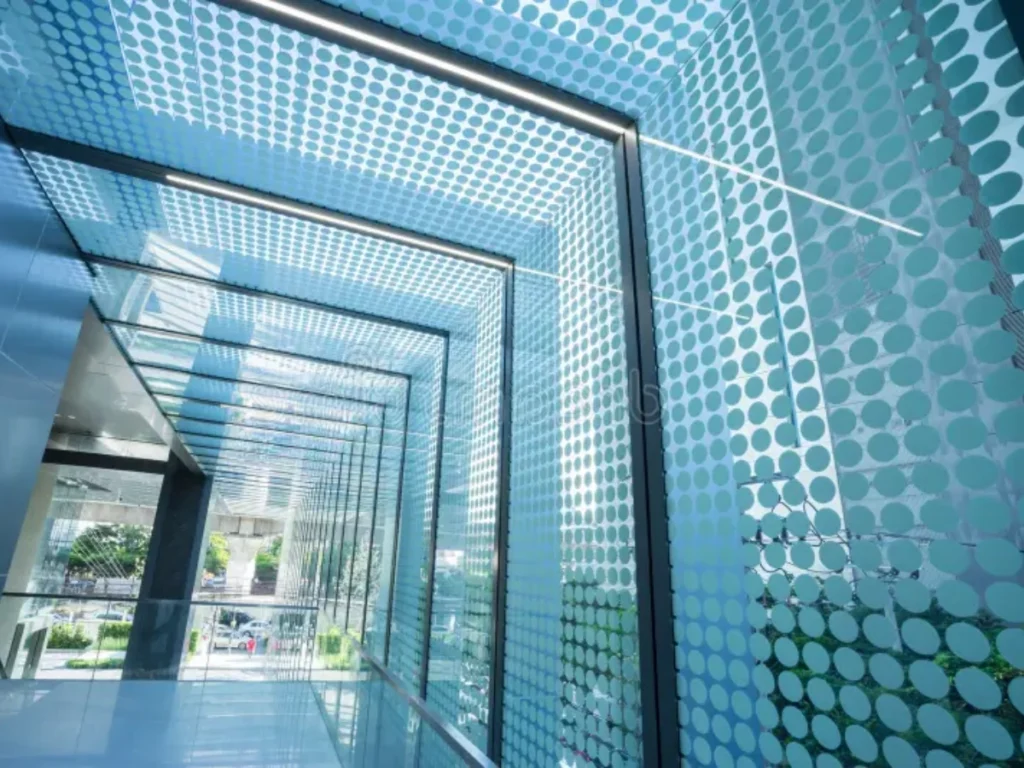 Dots ceramic fritted glass roof and fence